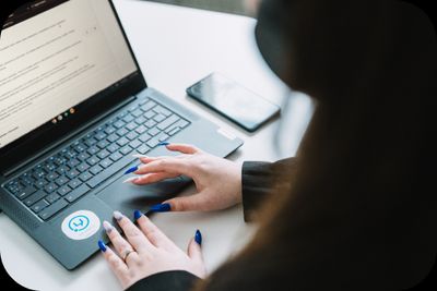 woman typing on a keyboard